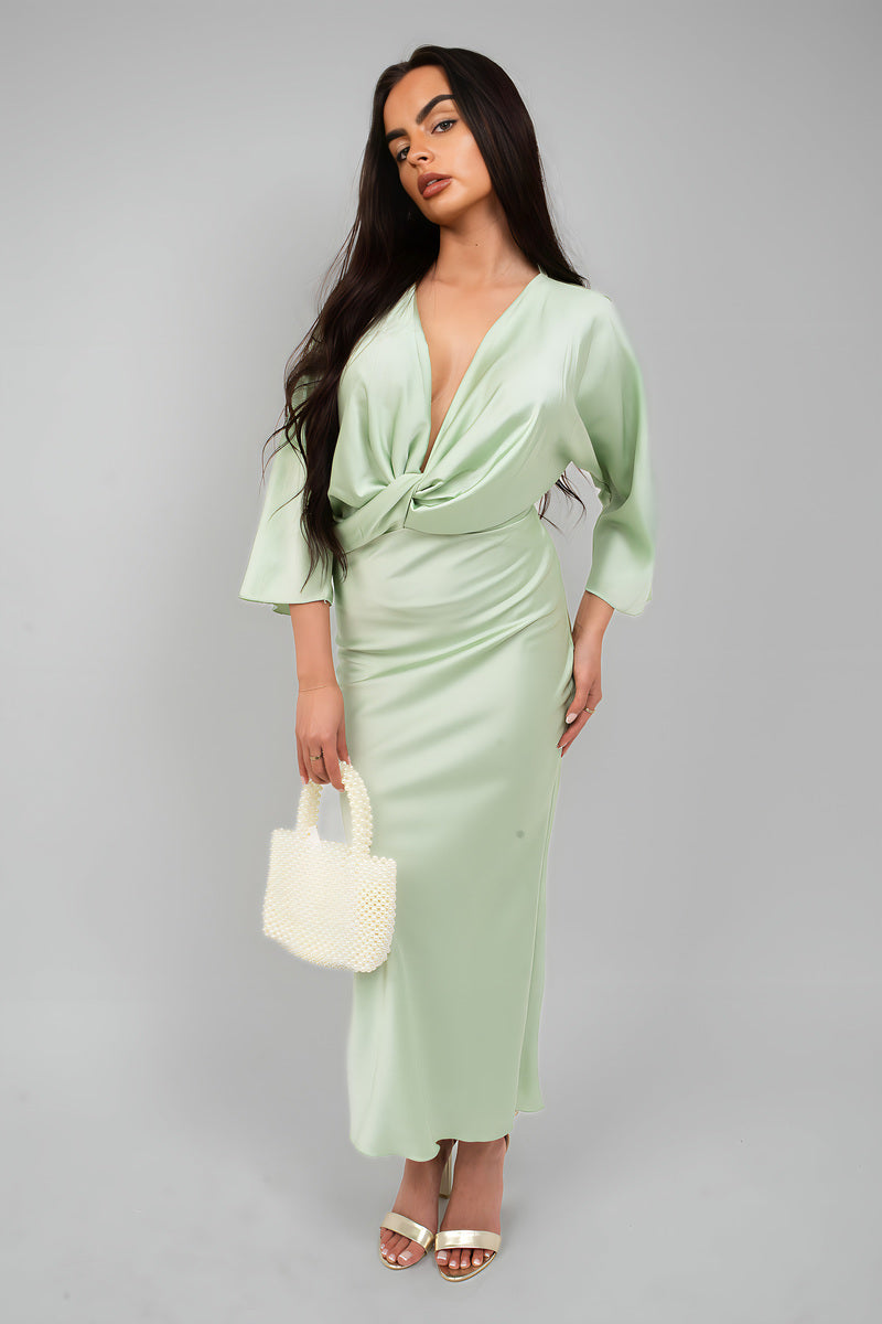 Flaunt Your Style with the Kylie V-Neck Twist Front Midi Dress