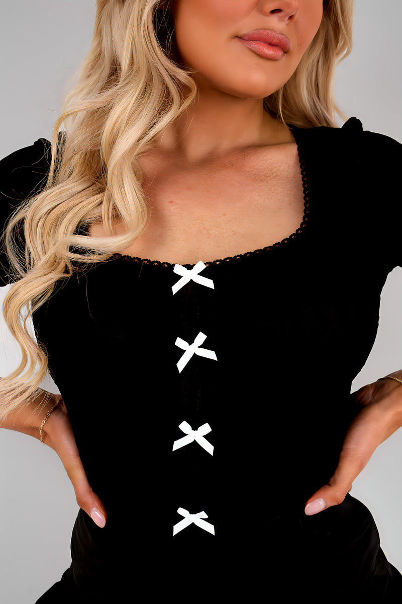 Shop this Charming Floral Embroidered Top with Bow Detail