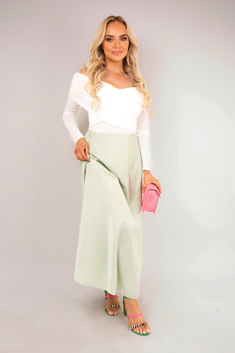 Shop Effortless Glam: Flattering Off-Shoulder Long Sleeve Draped Top with Wrap Front Detail